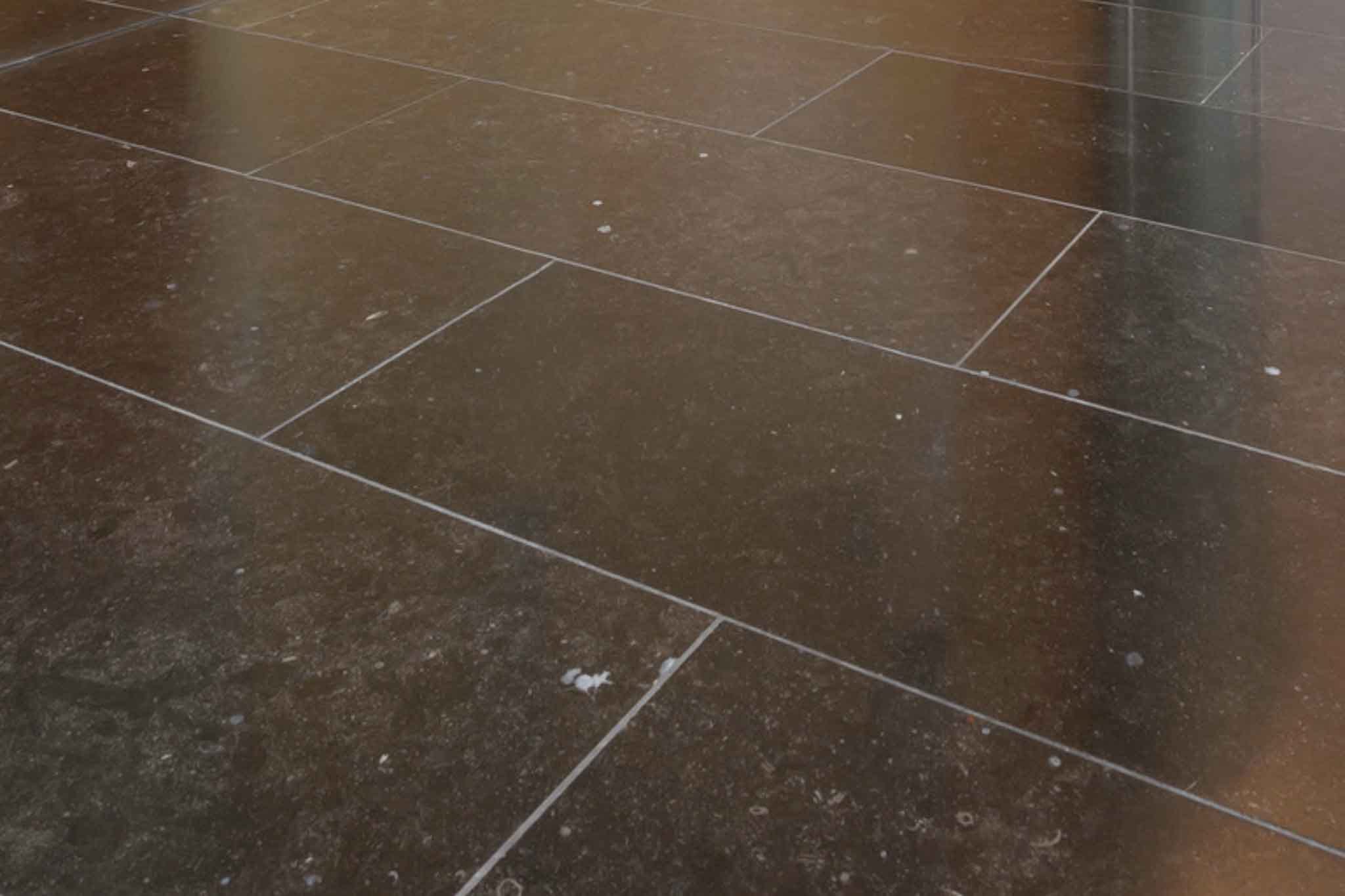 Dark gray limestone floor