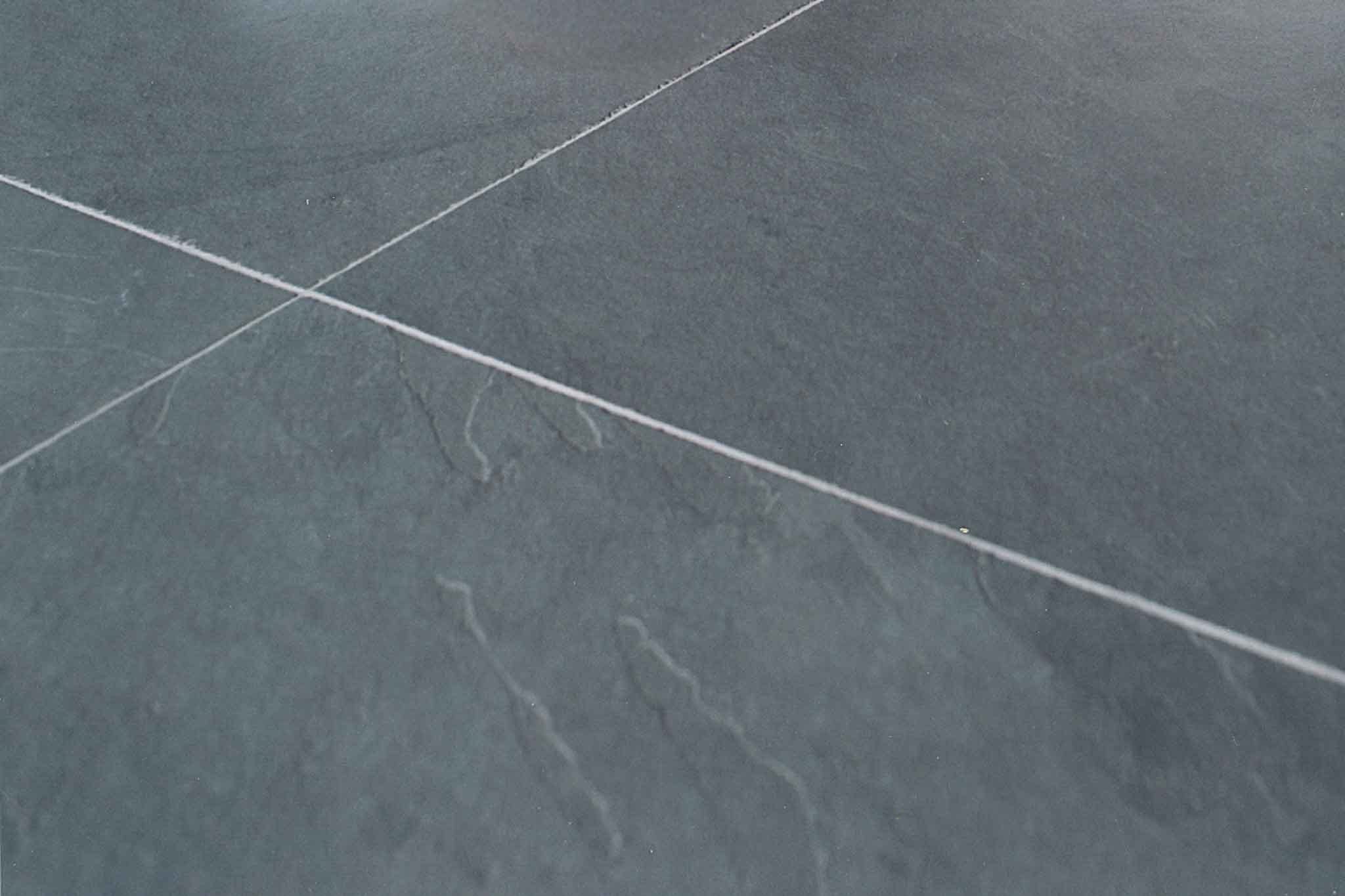 Grey slate natural stone floor, rough-cut